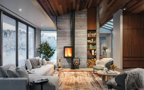 Chimenea moderna de leña, un ejemplo de los tipos de chimenea que calientan este acogedor salón con vistas nevadas.
