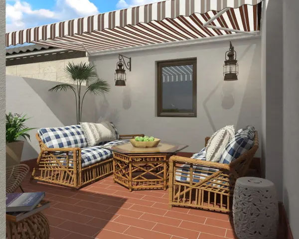 Cómodos sillones de mimbre con cojines a cuadros, mesa de centro con frutas, y un toldo a rayas. ¡Perfectas ideas de jardín para relajarse!