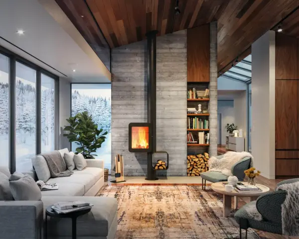 Chimenea moderna de leña, un ejemplo de los tipos de chimenea que calientan este acogedor salón con vistas nevadas.